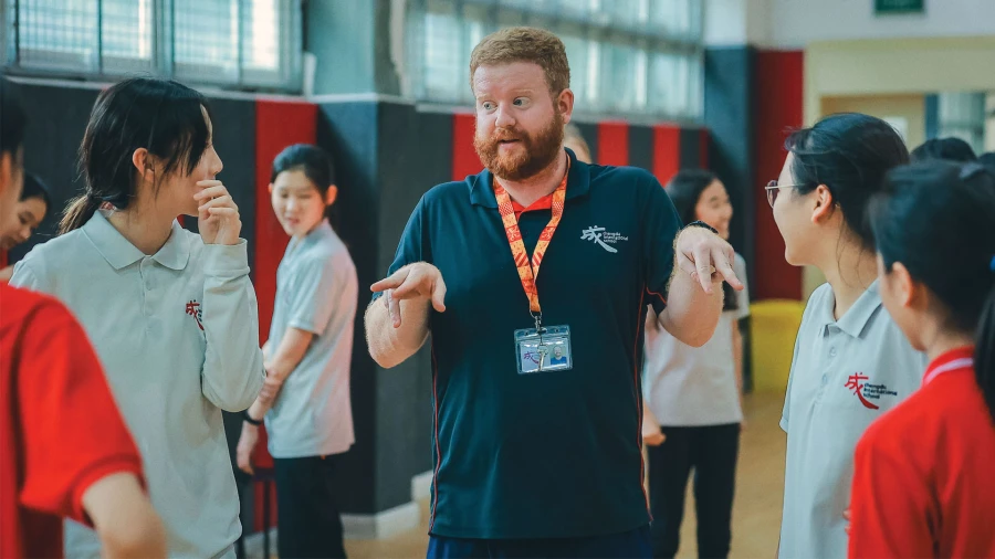 chengdu international school jobs like this gym teacher working with students every day